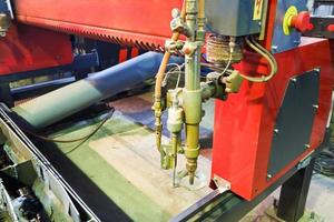 oxy-fuel torches of CNC cutting machine photo