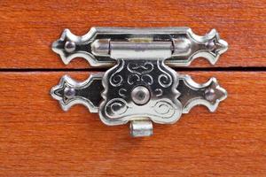 metal latch of wooden case photo