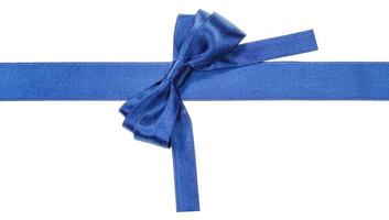 Turned blue bow on ribbon with square cut ends photo