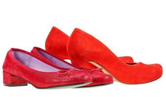 Two pairs of red woman pumps shoes photo