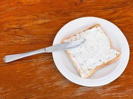 sandwich from toast and soft cheese with herbs photo