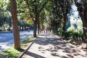 people in public park of Villa Borghese gardens photo