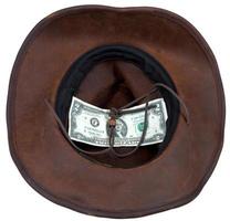 Cowboy hat with lucky bill isolated on white photo