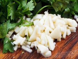 chopped garlic, parsley and cilantro photo