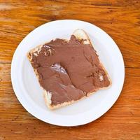 Sándwich dulce - tostadas con chocolate para untar foto