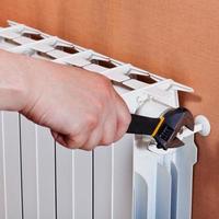 ajuste del radiador de calefacción foto
