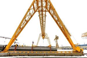 bridge crane over outdoor warehous photo