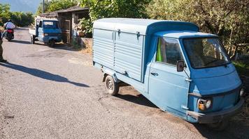 Three-wheeled country trucks in village in Sicily photo