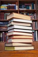 books on wooden table photo