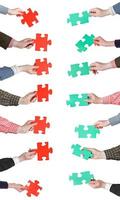 red and green puzzle pieces in people hands photo