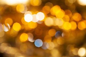 yellow brown blurred shimmering Christmas lights photo