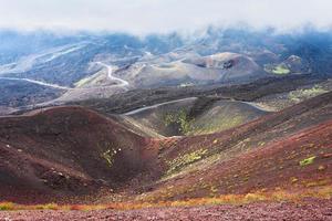 cloud over craters on Mount Etna photo