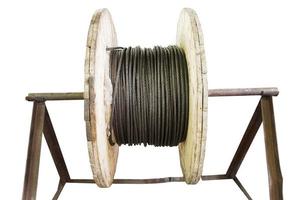 industrial wooden reel with steel rope isolated photo