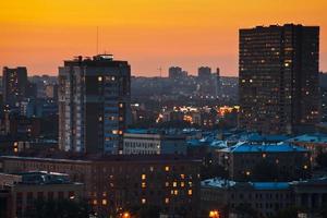 bright yellow sunset in big city photo