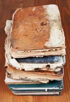 antique books on wooden table photo