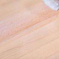 clear varnish on surface of beech worktop photo