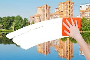 hand deletes new houses by orange rag photo