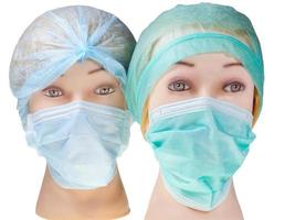 cabeza de médico ficticio con gorro quirúrgico textil y máscara foto