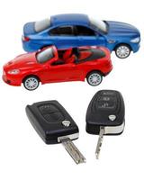 two vehicle keys close up and model cars photo