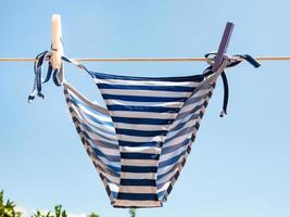 striped swimming panties is dried on clothesline photo