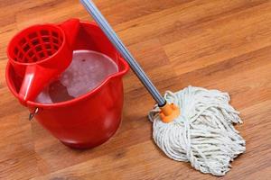 cleaning of floors by mop photo