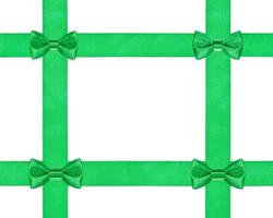 four little green bow knots on four satin ribbon photo