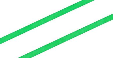 two diagonal parallel green satin ribbons photo