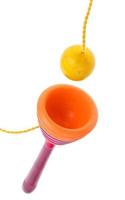 wooden Cup-and-ball ball in cup toy isolated photo