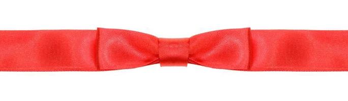 symmetrical red bow knot on wide silk ribbon photo
