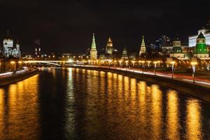 illuminated Moskva River and Kremlin in Moscow photo