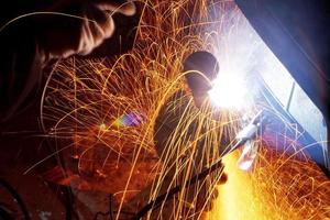 sparks during welding car photo