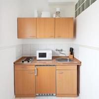 simple kitchen with furniture set photo