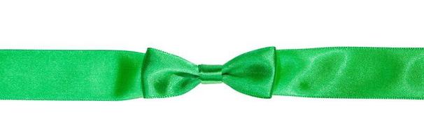 real bow knot on narrow green satin ribbon photo