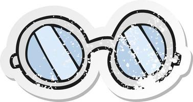 retro distressed sticker of a cartoon glasses vector