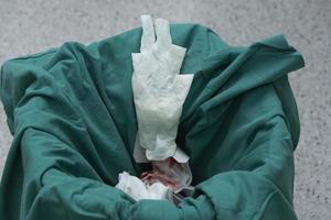 Surgical garbage bin in operating room photo