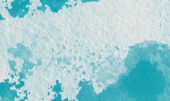 Abstract splashed watercolor textured background photo