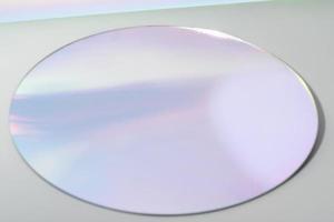 round mirror on grey background with trendy gradient reflection in lilac tones. Empty scene for product presentation. display stage. high angle view. copy space. photo