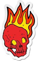 sticker of a cartoon flaming skull vector