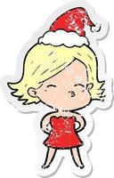 distressed sticker cartoon of a woman wearing santa hat vector