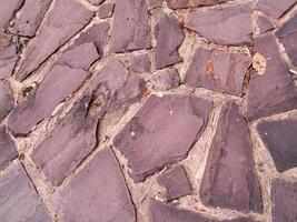 The texture of stone used for background images, Surface of stone brown color photo