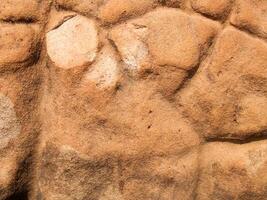 The texture of stone used for background images, Surface of stone brown color photo