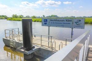 Hechthausen Lower Saxony Germany 2010 Beautiful natural landscape panorama jetty boat Oste river water Germany. photo