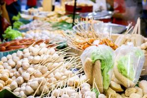 Thai style snack made from different kinds of steaming Pork, Fish and beef balls are popular of Thai people and quaint of foreigners. photo