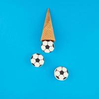 Football macaroons in waffle cones photo