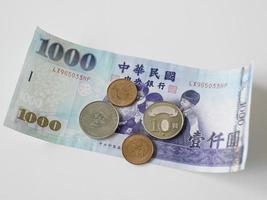 Taiwan banknotes and coins, 1000 Taiwan dollars. photo