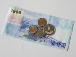 Taiwan banknotes and coins, 1000 Taiwan dollars. photo