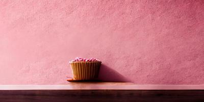 Pink background with cake photo