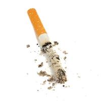 Cigarette butt ash isolated on white background photo
