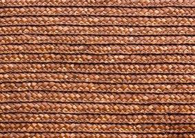 red handcraft rattan woven texture background photo