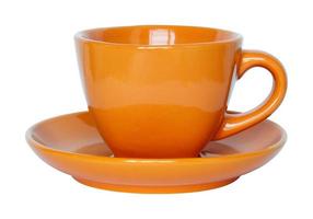 empty orange cup and saucer isolated on white with clipping path photo